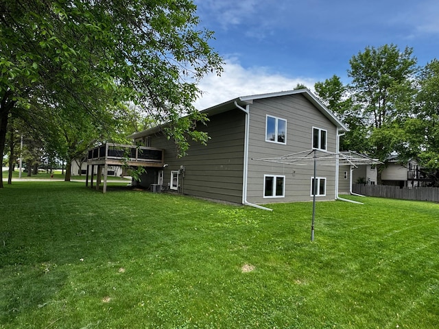 802 Estates Ave, Litchfield, MN 55355 - view of side of home with a deck