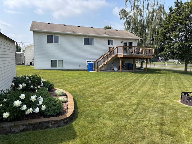 2030 Joes Lake Rd SE, Cambridge, MN 55008 - rear view of house featuring stairway, a wooden deck, and a shingled roof