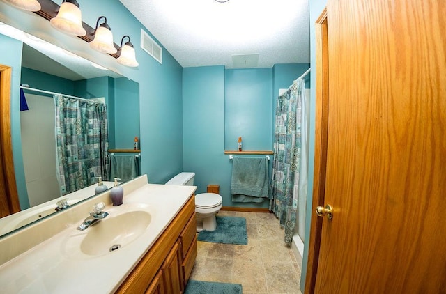 2030 Joes Lake Rd SE, Cambridge, MN 55008 - bathroom with vanity, a shower with curtain, and stone finish flooring