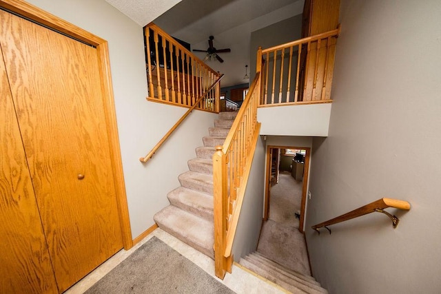 2030 Joes Lake Rd SE, Cambridge, MN 55008 - staircase featuring carpet flooring and a ceiling fan