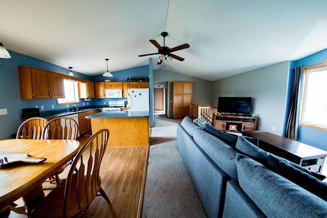 2030 Joes Lake Rd SE, Cambridge, MN 55008 - living room with lofted ceiling, light wood-style floors, and ceiling fan