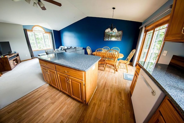 2030 Joes Lake Rd SE, Cambridge, MN 55008 - kitchen with vaulted ceiling, ceiling fan, light wood-style flooring, a chandelier, and brown cabinets