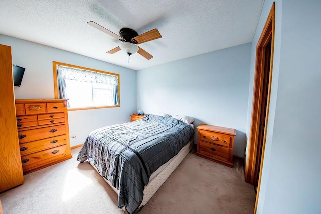 2030 Joes Lake Rd SE, Cambridge, MN 55008 - bedroom featuring carpet, a textured ceiling, and ceiling fan