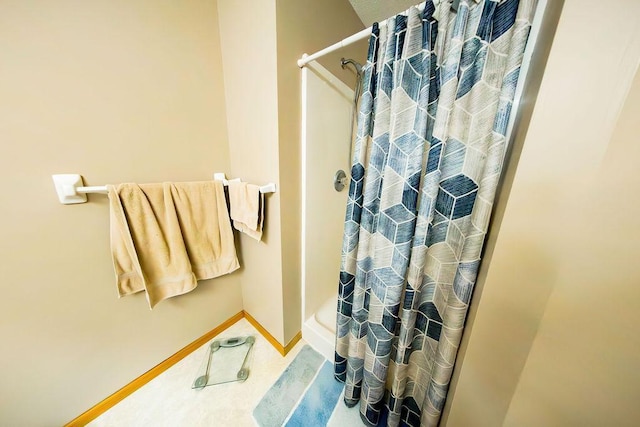2030 Joes Lake Rd SE, Cambridge, MN 55008 - full bath with a shower with curtain and baseboards