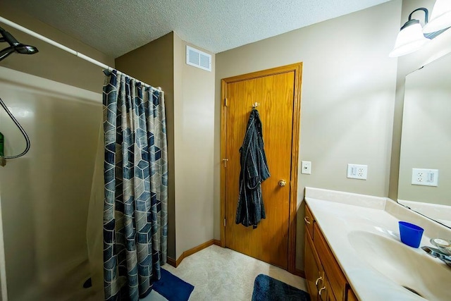 2030 Joes Lake Rd SE, Cambridge, MN 55008 - full bathroom featuring vanity, curtained shower, and a textured ceiling