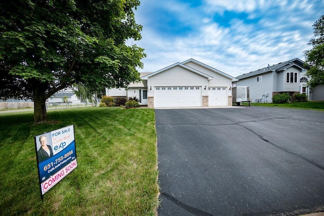 2030 Joes Lake Rd SE, Cambridge, MN 55008 - ranch-style home with driveway and an attached garage