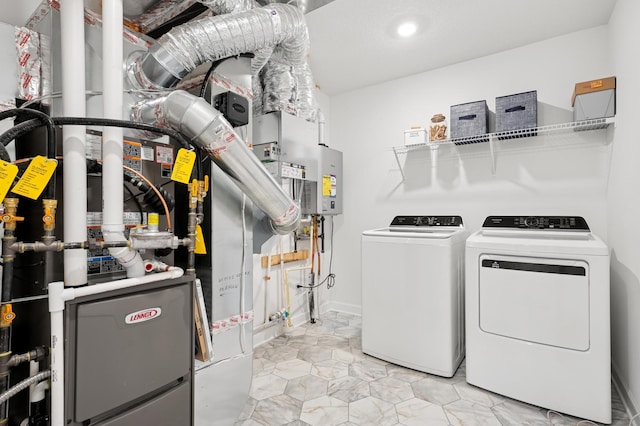 2451 Jandell Ave NE, Saint Michael, MN 55376 - laundry area featuring washer and clothes dryer and heating unit