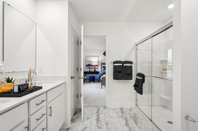 2451 Jandell Ave NE, Saint Michael, MN 55376 - ensuite bathroom featuring marble finish floors, double vanity, and a stall shower