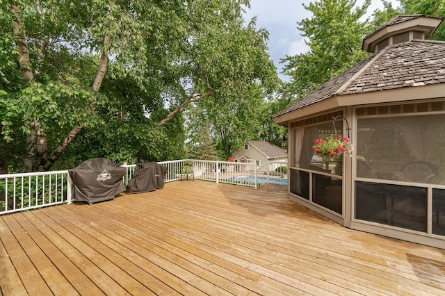 805 5th St NW, Kasson, MN 55944 - wooden terrace featuring area for grilling