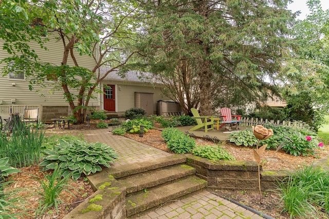 805 5th St NW, Kasson, MN 55944 - view of front of house with a patio area