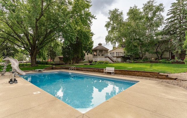 805 5th St NW, Kasson, MN 55944 - swimming pool featuring a water slide, a yard, and a patio