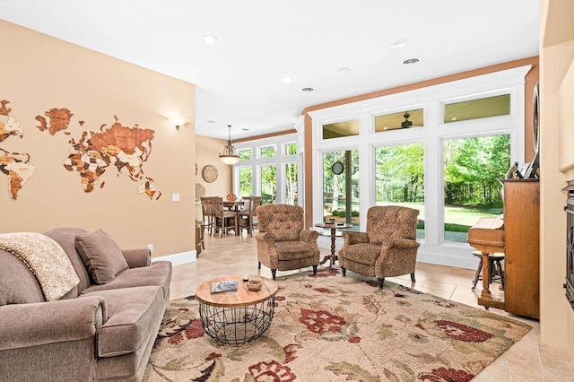 79394 Long Lake Rd, Kettle River Twp, MN 55795 - living room with recessed lighting, light tile patterned flooring, and baseboards
