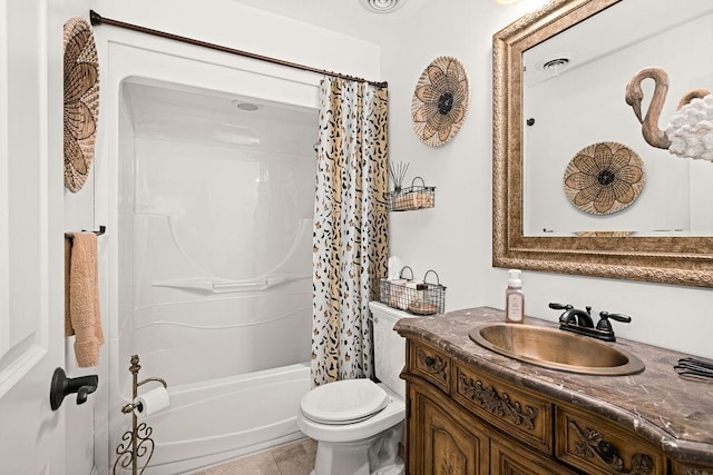 79394 Long Lake Rd, Kettle River Twp, MN 55795 - bathroom featuring vanity, shower / bath combo, toilet, and tile patterned flooring