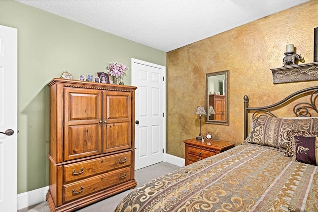 79394 Long Lake Rd, Kettle River Twp, MN 55795 - carpeted bedroom featuring baseboards and a textured ceiling