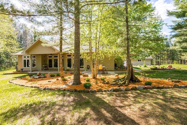 79394 Long Lake Rd, Kettle River Twp, MN 55795 - back of property featuring a patio and a yard