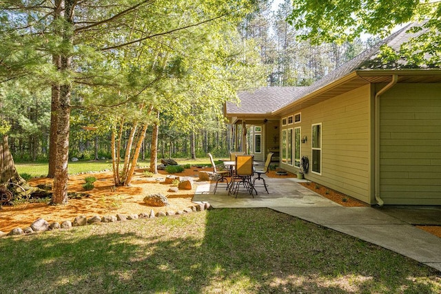 79394 Long Lake Rd, Kettle River Twp, MN 55795 - view of grassy yard with a patio