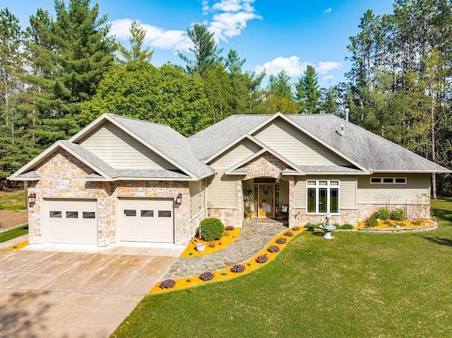 79394 Long Lake Rd, Kettle River Twp, MN 55795 - craftsman house featuring stone siding, a front lawn, an attached garage, driveway, and a shingled roof
