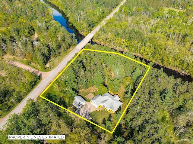 79394 Long Lake Rd, Kettle River Twp, MN 55795 - aerial view of property's location featuring a large body of water, property parcel outlined, and a heavily wooded area