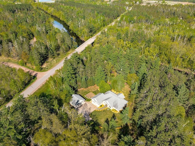 79394 Long Lake Rd, Kettle River Twp, MN 55795 - drone / aerial view of a heavily wooded area and a nearby body of water