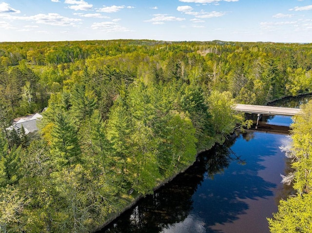 79394 Long Lake Rd, Kettle River Twp, MN 55795 - bird's eye view of a heavily wooded area, a notable bridge, and a large body of water