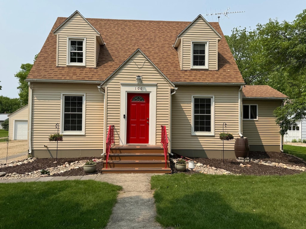 106 Kentucky Ave, Hoffman, MN 56339 - cape cod house with a front yard and roof with shingles