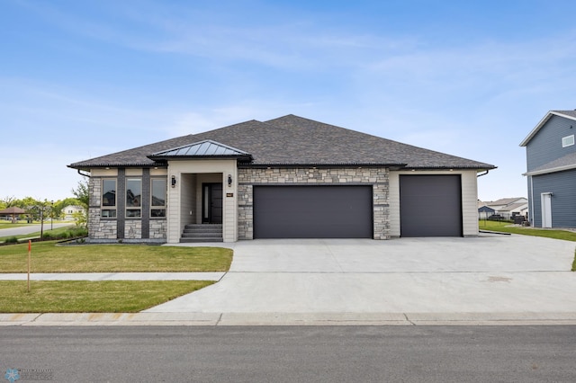 7886 Firefly Ln, Horace, ND 58047 - view of front of house with an attached garage, a front lawn, concrete driveway, a shingled roof, and stone siding