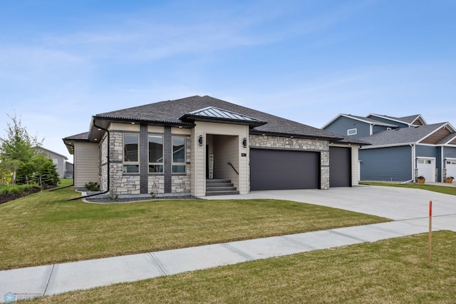 7886 Firefly Ln, Horace, ND 58047 - prairie-style house featuring a garage, stone siding, concrete driveway, and a front lawn