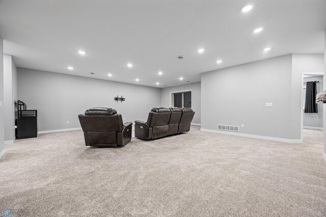 7886 Firefly Ln, Horace, ND 58047 - carpeted living area featuring recessed lighting and baseboards