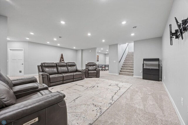 7886 Firefly Ln, Horace, ND 58047 - carpeted living room featuring stairway, recessed lighting, and baseboards