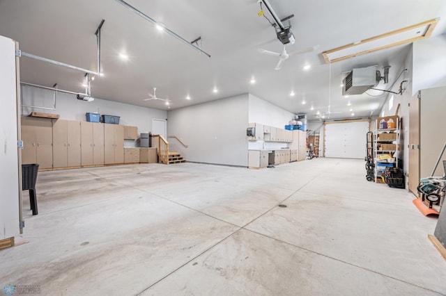 7886 Firefly Ln, Horace, ND 58047 - garage featuring a garage door opener