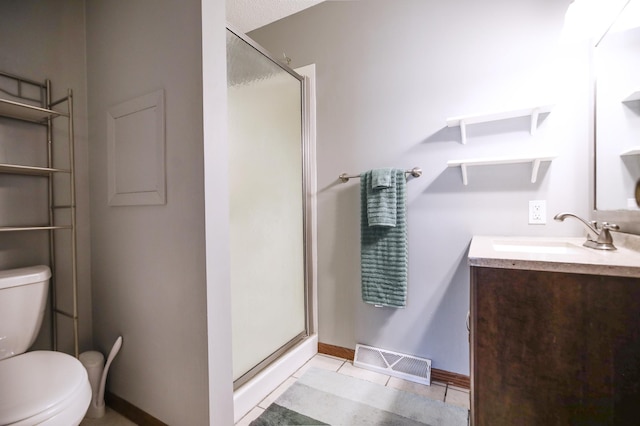 308 18th Ave NE, Waseca, MN 56093 - full bathroom with toilet, a shower stall, vanity, and baseboards