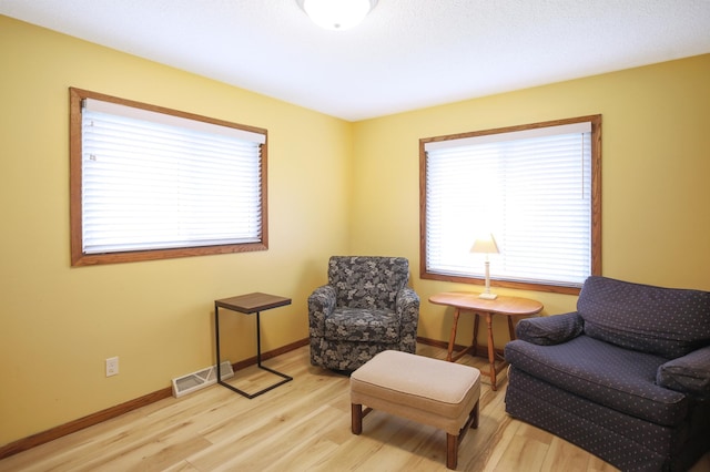 308 18th Ave NE, Waseca, MN 56093 - living area with wood finished floors and baseboards
