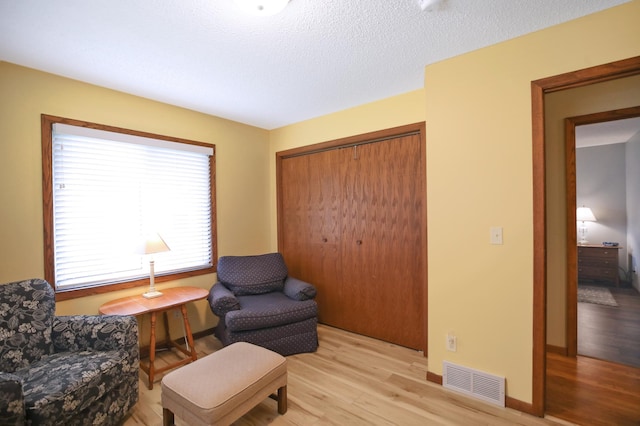 308 18th Ave NE, Waseca, MN 56093 - living area with light wood-type flooring and baseboards
