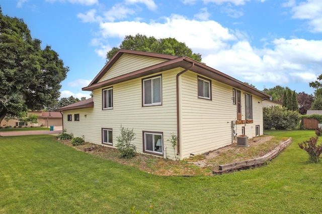 308 18th Ave NE, Waseca, MN 56093 - view of property exterior with a lawn