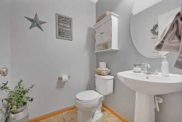 10542 188th Ave NW, Elk River, MN 55330 - bathroom featuring baseboards and toilet