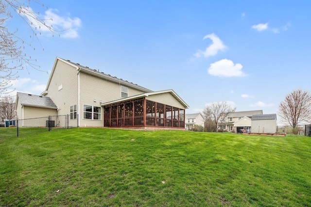10542 188th Ave NW, Elk River, MN 55330 - rear view of property featuring a sunroom and central AC