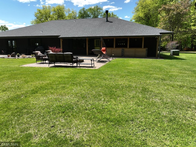 3004 370th Ave, Sandstone, MN 55072 - rear view of property featuring a patio, a yard, and roof with shingles