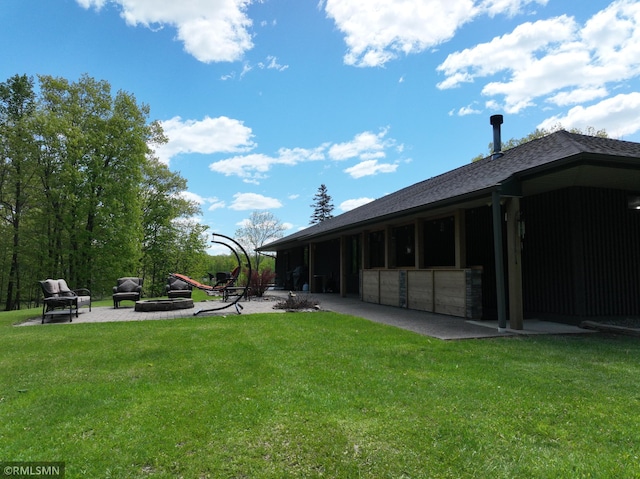 3004 370th Ave, Sandstone, MN 55072 - view of grassy yard with an outdoor fire pit