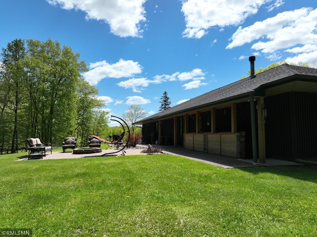 3004 370th Ave, Sandstone, MN 55072 - view of yard with a fire pit and an exterior structure