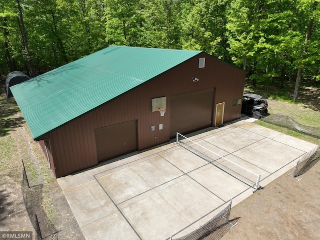 3004 370th Ave, Sandstone, MN 55072 - detached garage with a forest view