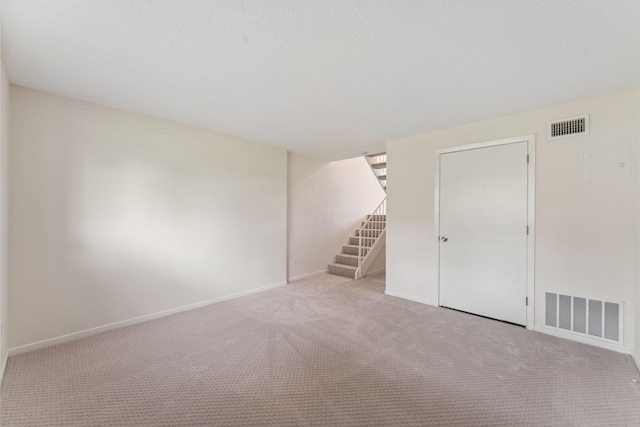 5707 80th Ave N, Brooklyn Park, MN 55443 - carpeted empty room with stairway and baseboards