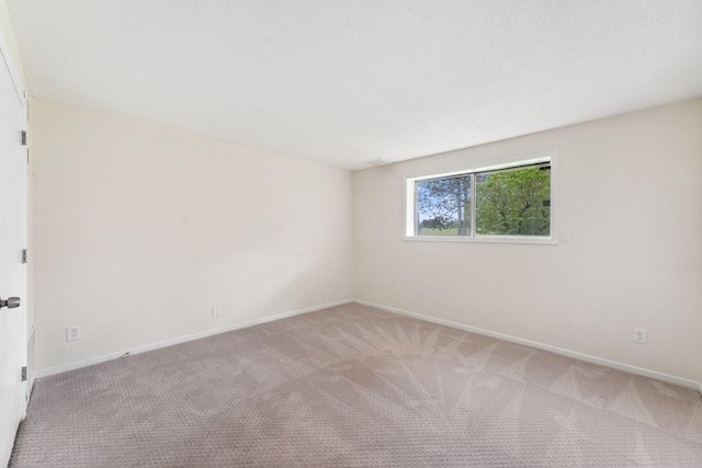5707 80th Ave N, Brooklyn Park, MN 55443 - spare room with light carpet and baseboards