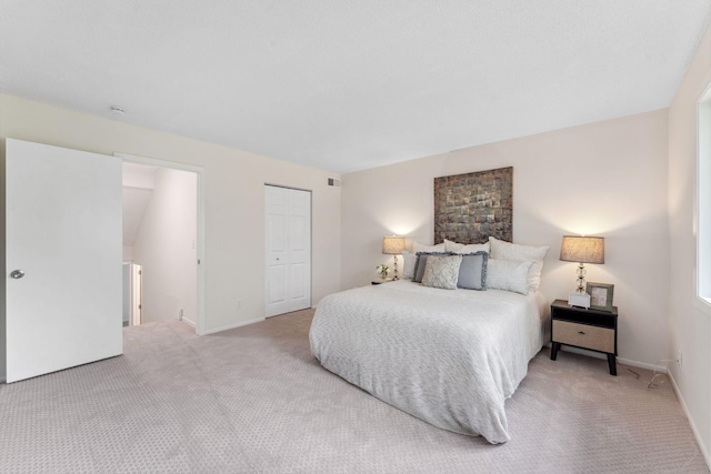 5707 80th Ave N, Brooklyn Park, MN 55443 - carpeted bedroom featuring a closet and baseboards