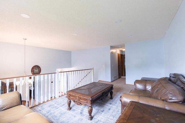 9309 Loch Lomond Ln, Brooklyn Park, MN 55443 - living room with carpet floors, a chandelier, and baseboards