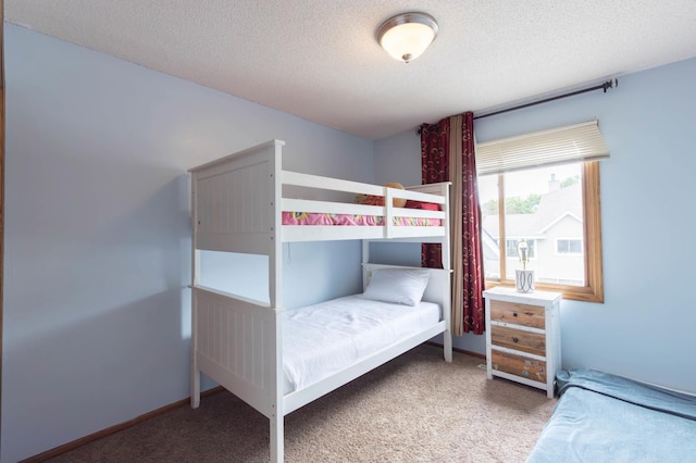 9309 Loch Lomond Ln, Brooklyn Park, MN 55443 - bedroom with carpet and a textured ceiling