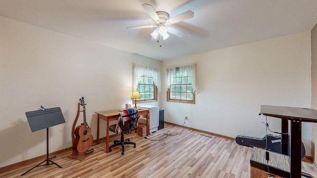 409 Hillcrest St E, Lanesboro, MN 55949 - office space featuring a ceiling fan, baseboards, and light wood-style floors