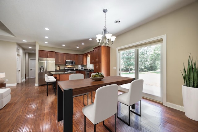 67457 152nd Ave, Greenfield Twp, MN 55981 - dining space featuring a chandelier, dark wood-style floors, baseboards, and recessed lighting