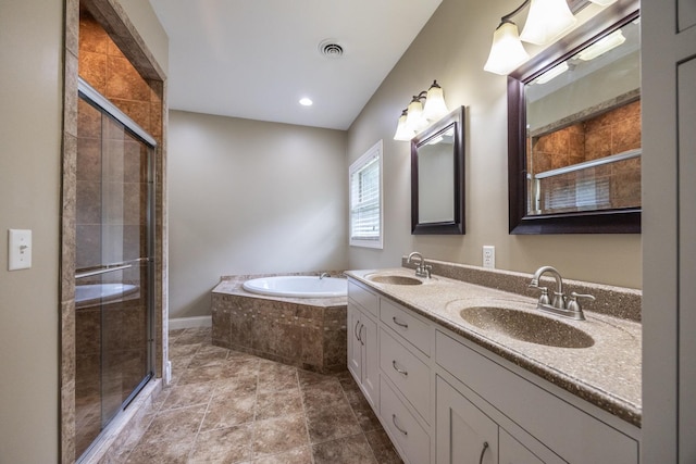 67457 152nd Ave, Greenfield Twp, MN 55981 - full bath featuring a garden tub, a shower stall, double vanity, and baseboards