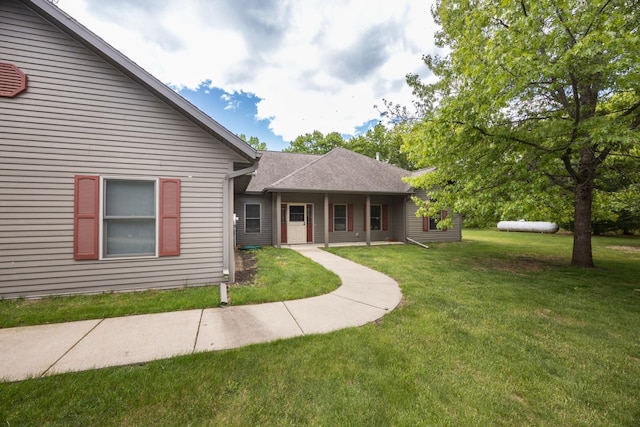 67457 152nd Ave, Greenfield Twp, MN 55981 - ranch-style home featuring a front lawn and roof with shingles