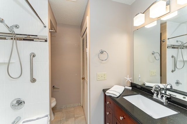 2051 Carriage Dr SW Unit 2051A, Rochester, MN 55902 - bathroom featuring toilet, vanity, tile patterned flooring, a closet, and a textured ceiling